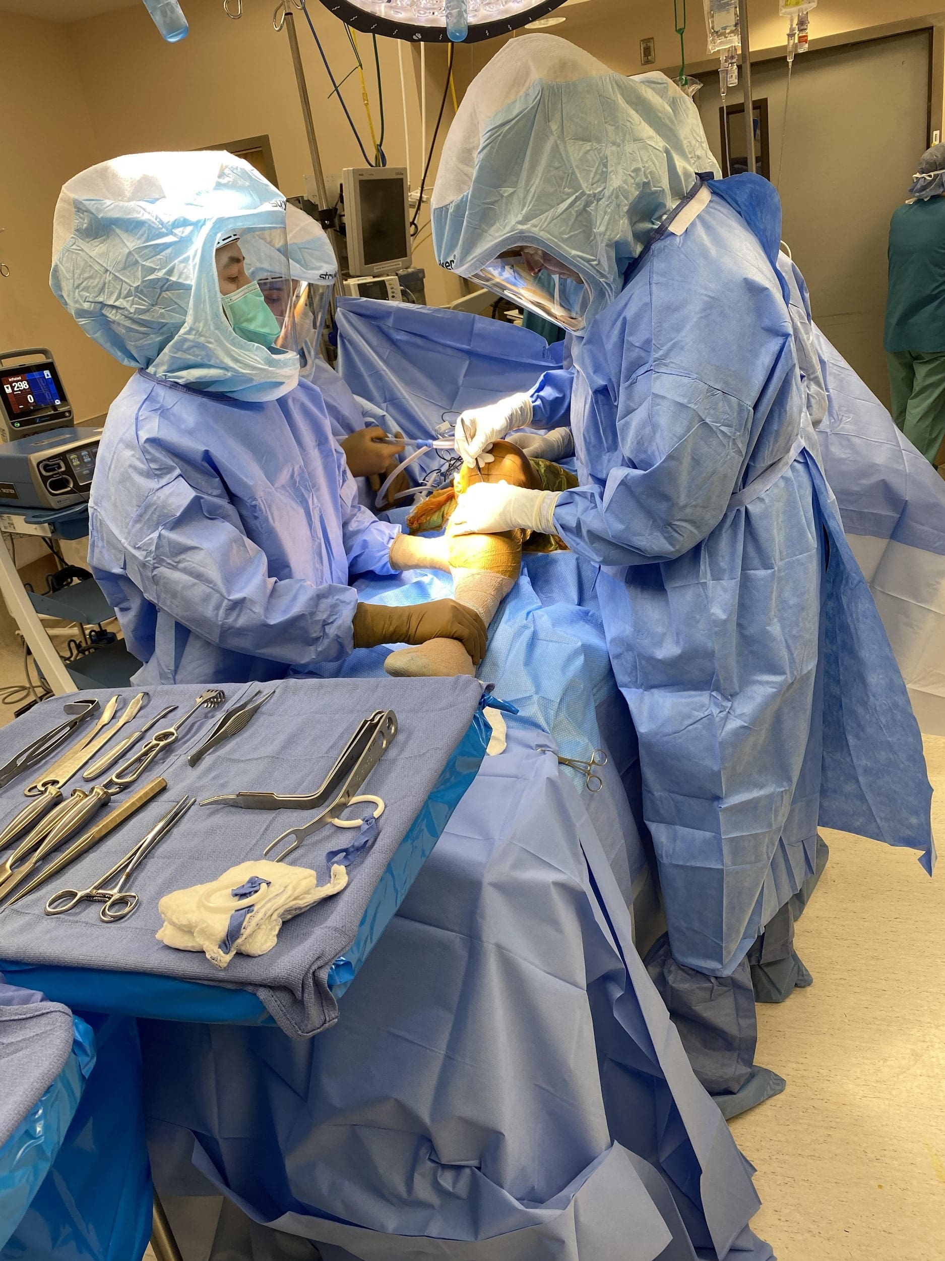 Doctors performing surgery Doctors performing surgery